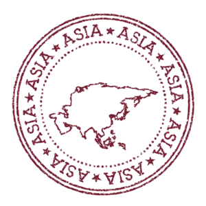 A circular stamp with the outline of Asia.
