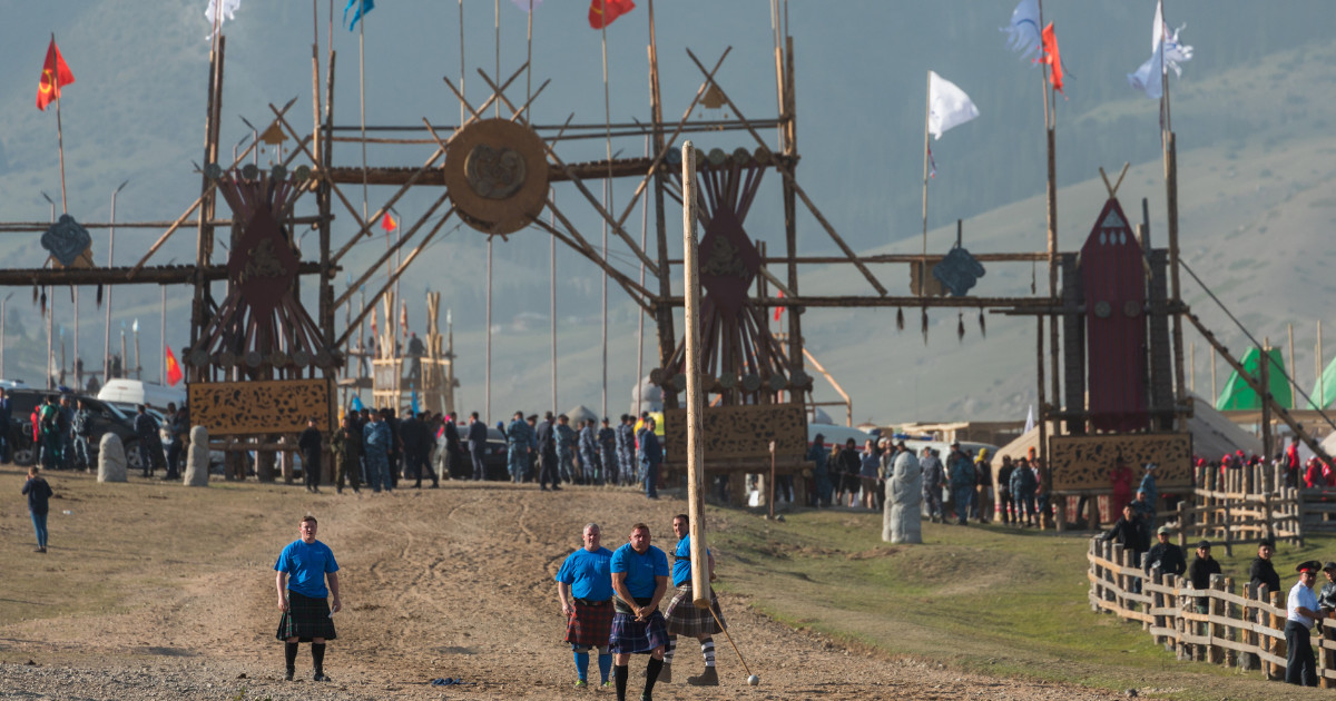  Athletes of Scottish Highland Games playing Caber toss during World Nomad Games