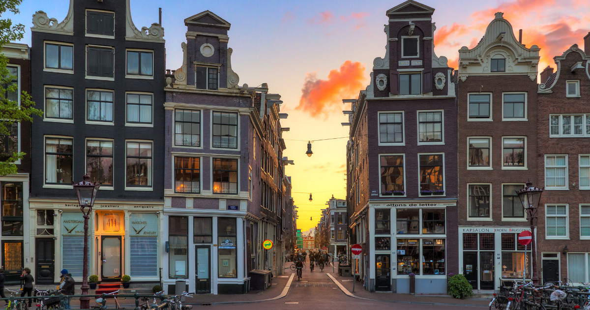 Beautiful sunset at one of nine little streets, a popular touristic destination in Amsterdam, The Netherlands, 