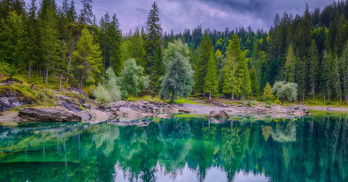 Caumasee Switzerland Lake Cauma is a small lake like many in Switzerland, it has the prettiest deep blue color