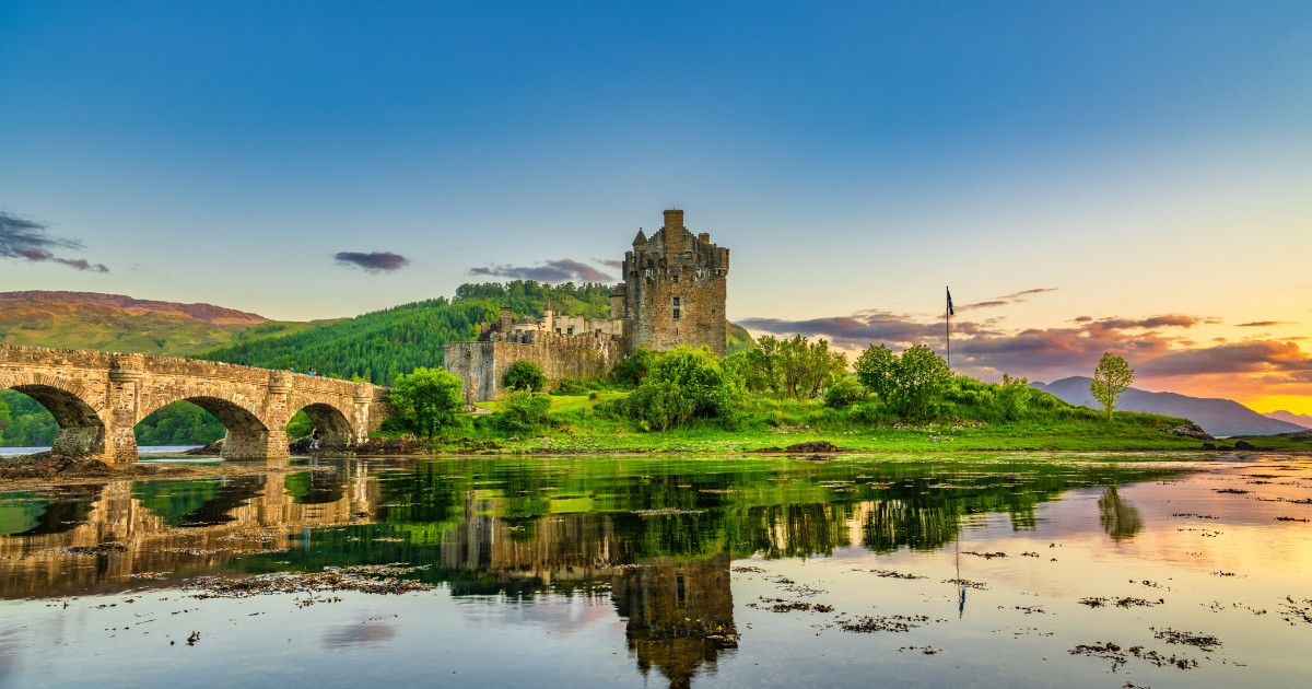 Eilean Donan Castle at sunset in Scotland