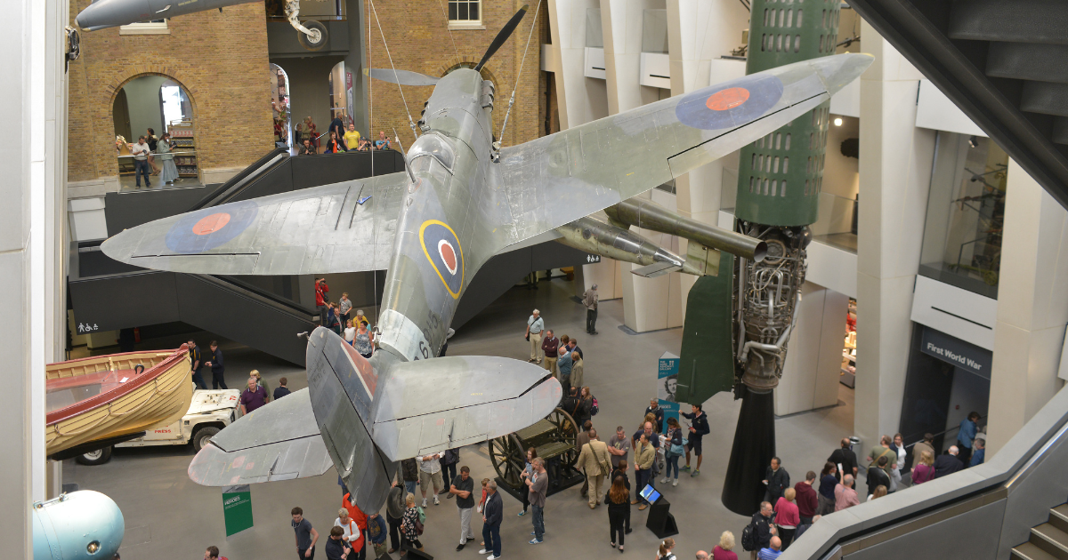 The Imperial War Museum in London, featuring a Supermarine Spitfire aircraft on display.