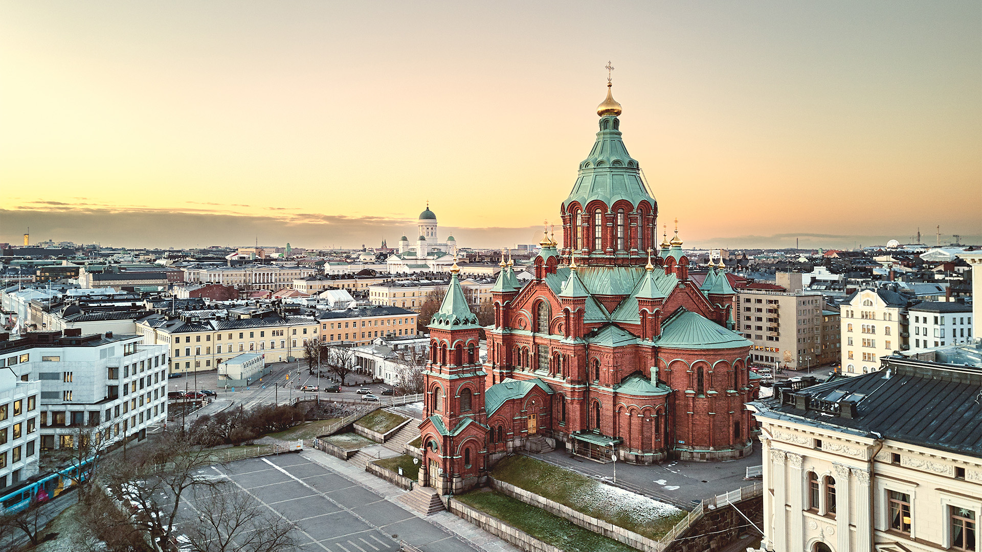 Uspenski Cathedral, a majestic Orthodox cathedral with colorful domes, standing tall in the heart of Helsinki, Finland.