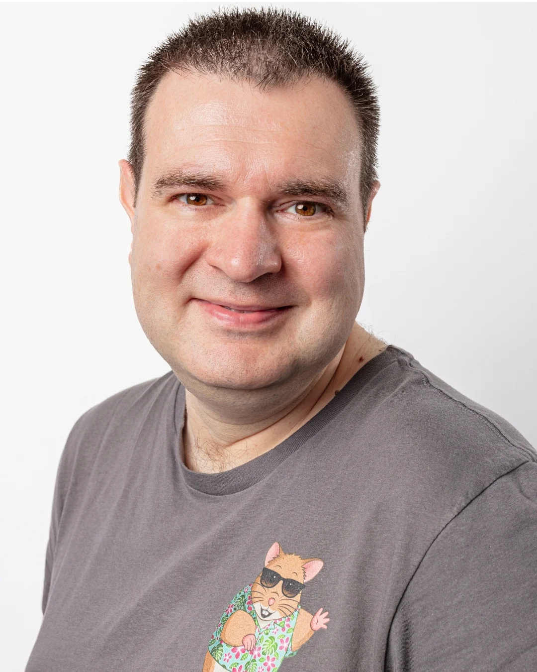 Martin Walker side profile in Holiday Hamster t-shirt