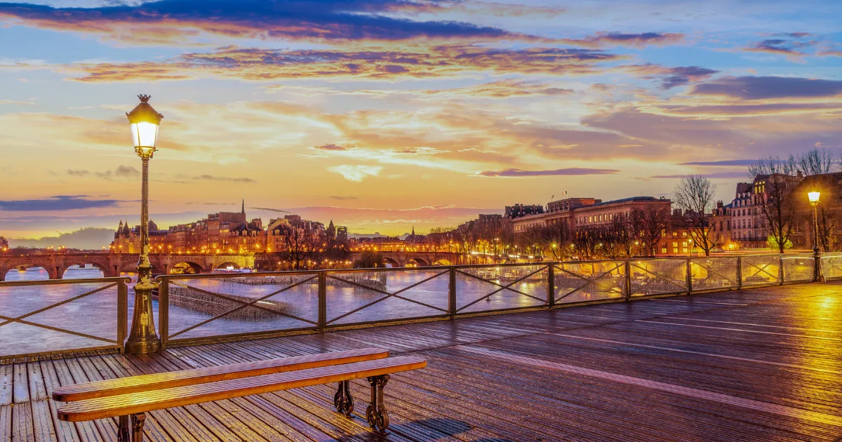 River Seine with Pont des Arts at sunrise in Paris, France