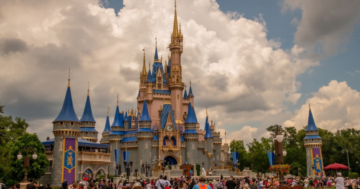 The iconic Cinderella Castle at Walt Disney World Resort, surrounded by a charming moat.